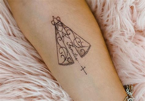 tatuagem de nossa senhora aparecida na mão Tattoo Nossa Senhora com o rosto triste